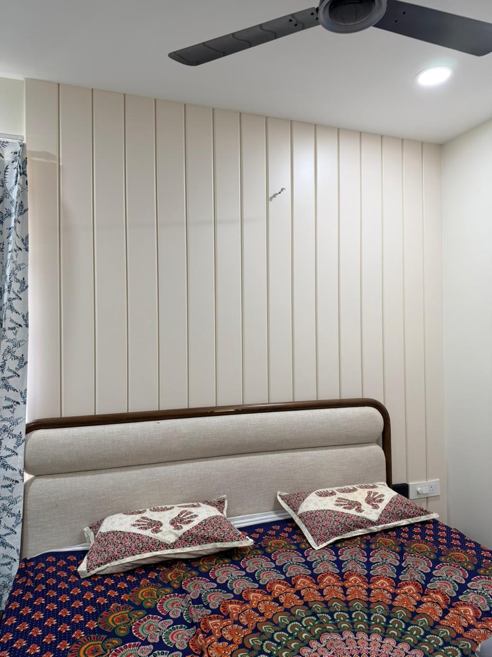 Bedroom fluted wall panel design for modern premium homes