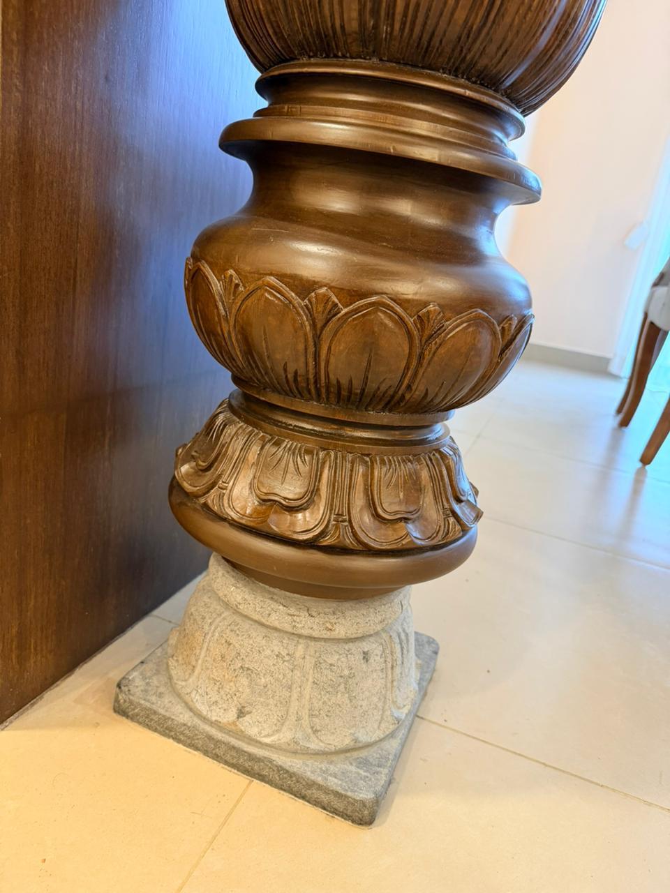 Carved heritage wood column detail for premium interiors