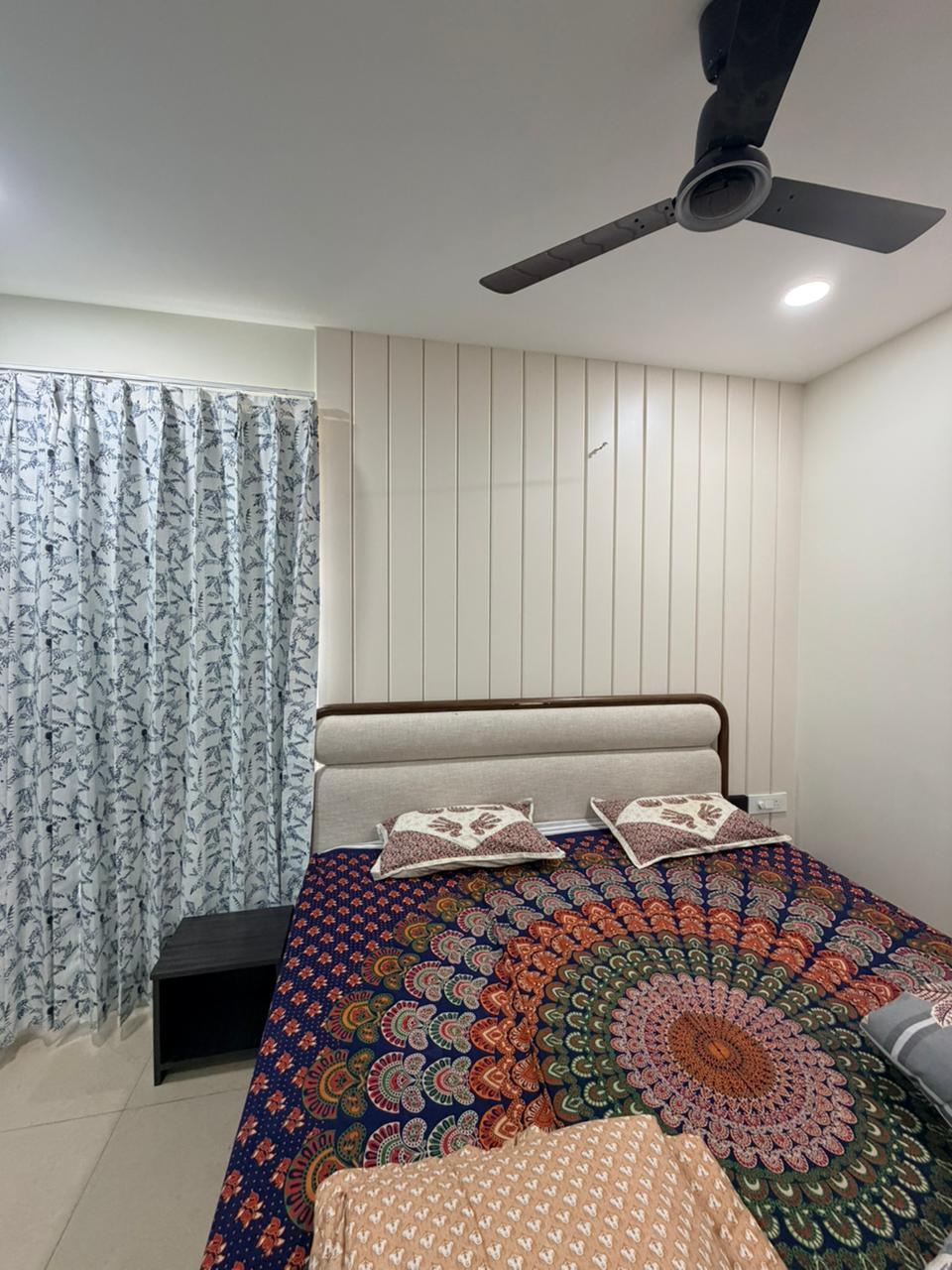 Modern bedroom soft panel wall design in Tamil Nadu