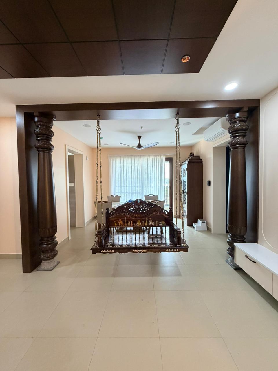 Open living and dining hall with premium column detailing
