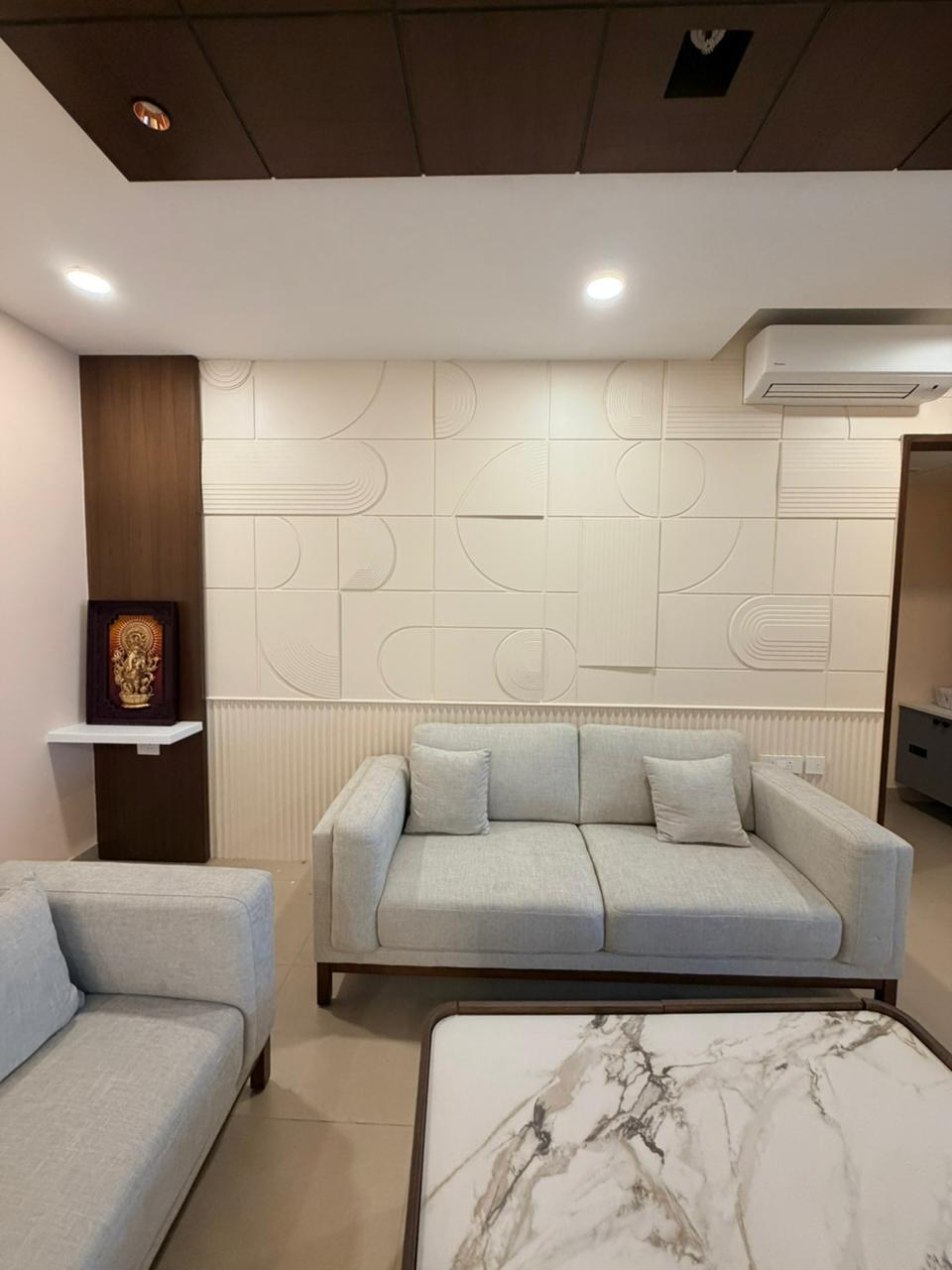 Premium neutral sofa living room interior design in Chennai