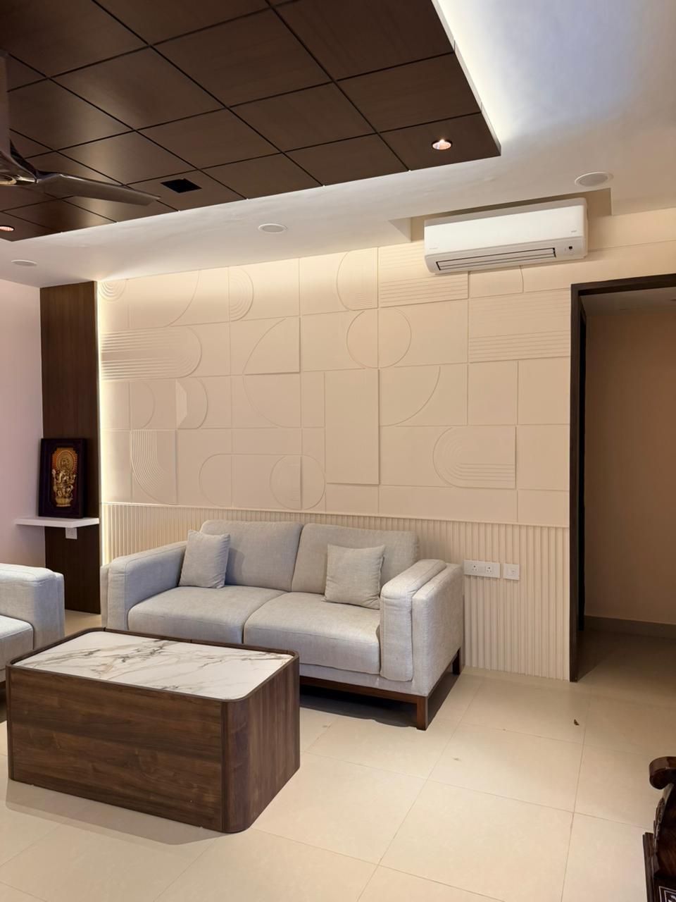 Premium living room sofa with white wall panel design