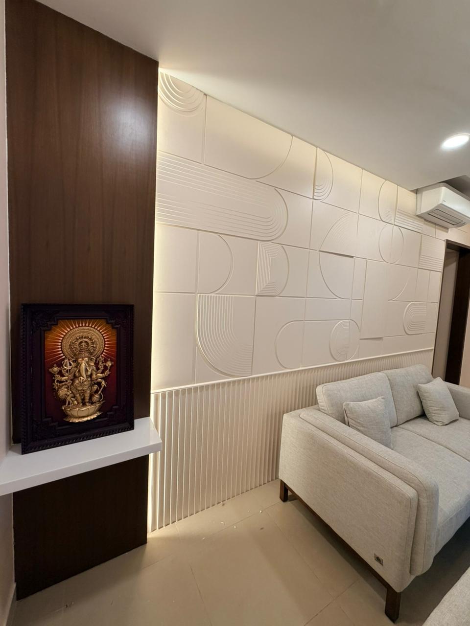 Premium living room wall niche and sofa design in Chennai
