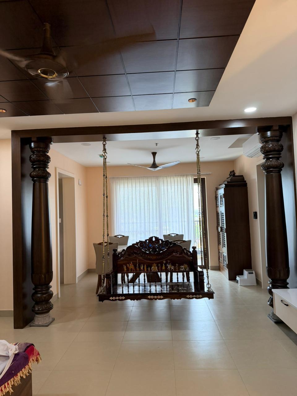 Traditional swing dining hall interior for premium Chennai homes