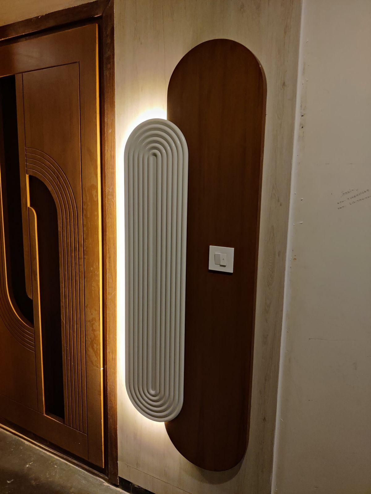 Arched mirror and wall panel design for premium interiors