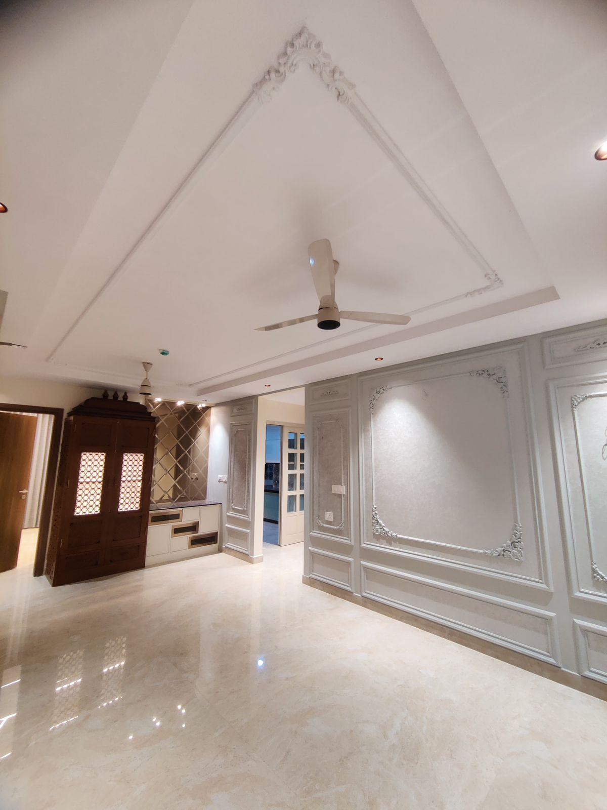 Premium hall false ceiling design with layered lighting